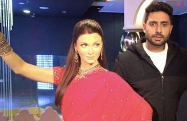 Abhishek Bachchan Poses With Wife Aishwarya At Madame Tussauds