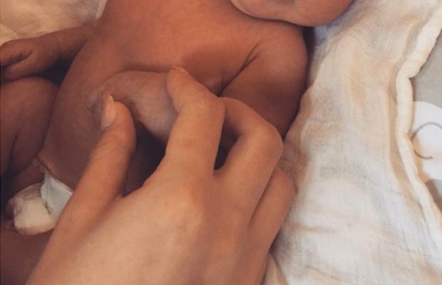 Adorable! John Legend Shares First Picture Of Baby Luna