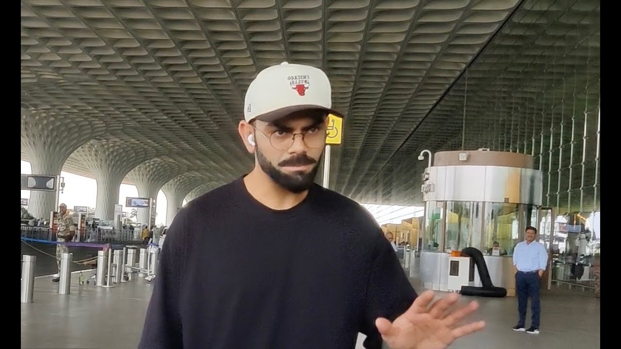 Videos : UNCUT VIDEO : CRICKETER VIRAT KOHIL LOOKING COOL AT AIRPORT
